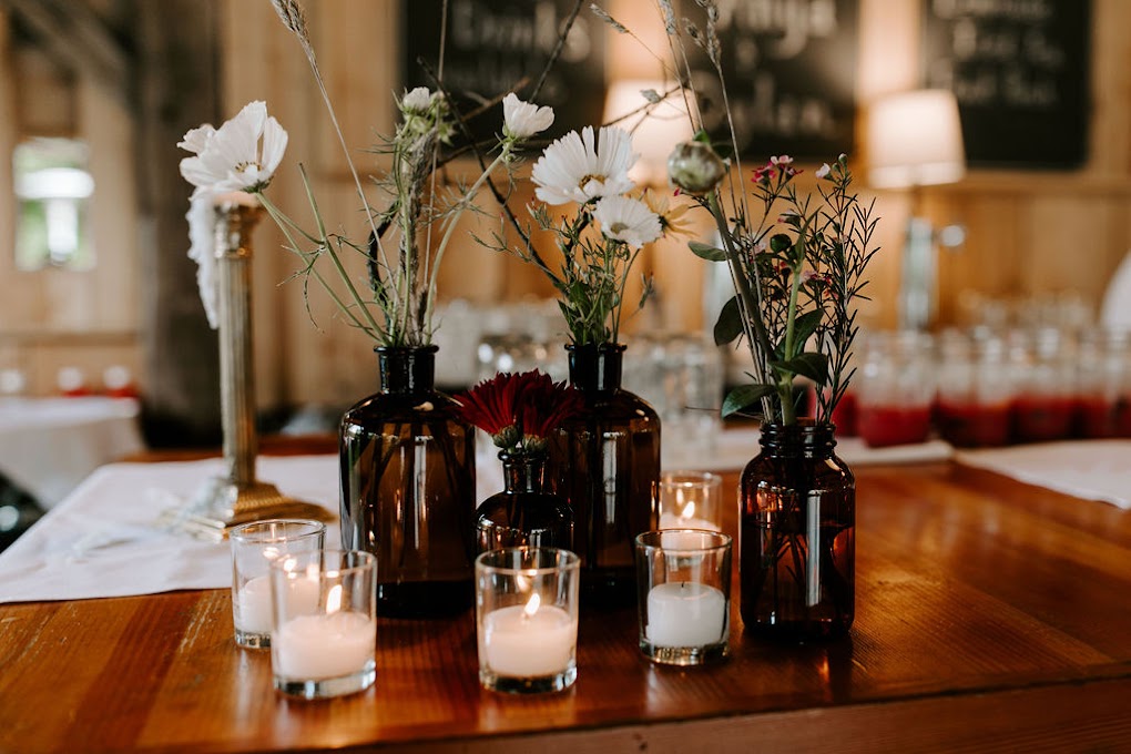 wildflowers in amber bottles