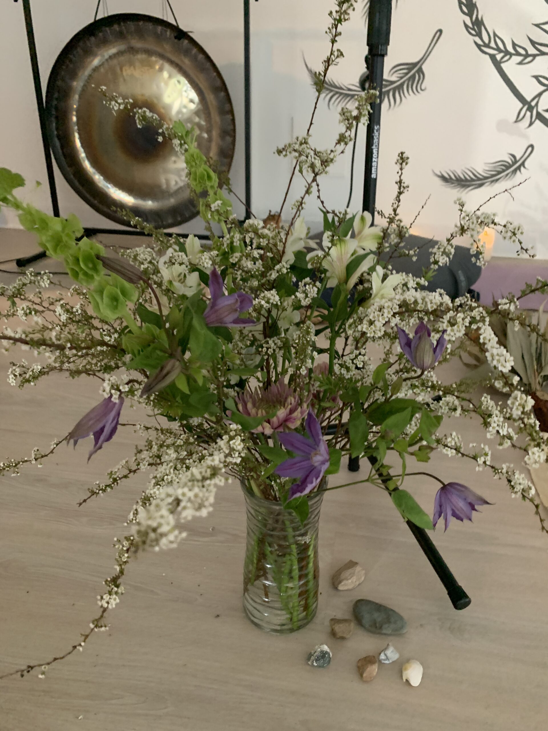 White, purple and green vase arrangement