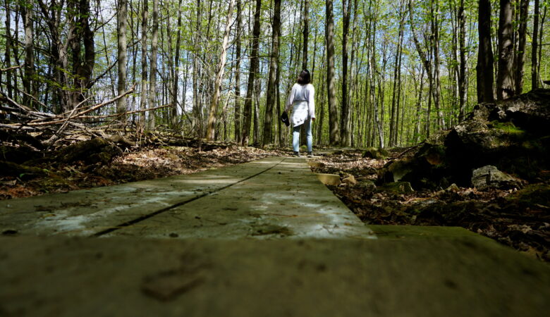 Woman in woods of South Burlington