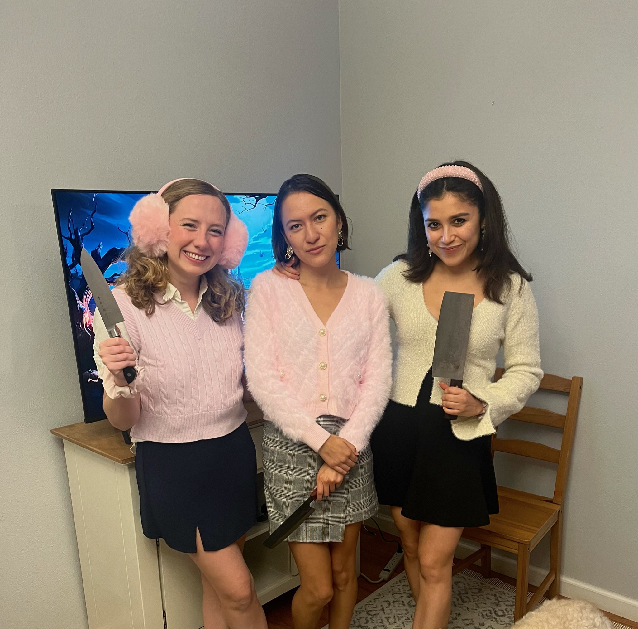 three women dressed as scream queens characters